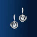 Cercei Mahashakti din aur 14K sau 18K alb, 8.78 g, cu 26 diamante G Color, claritate VS/SI1 (0.280 ct), 17 mm. Simbol al energiei feminine primordiale.